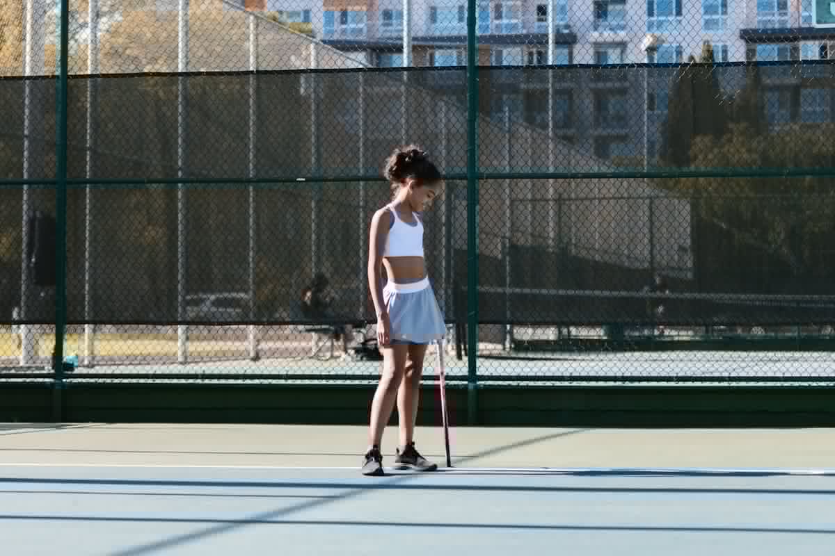 Pickleball player in action on the court
