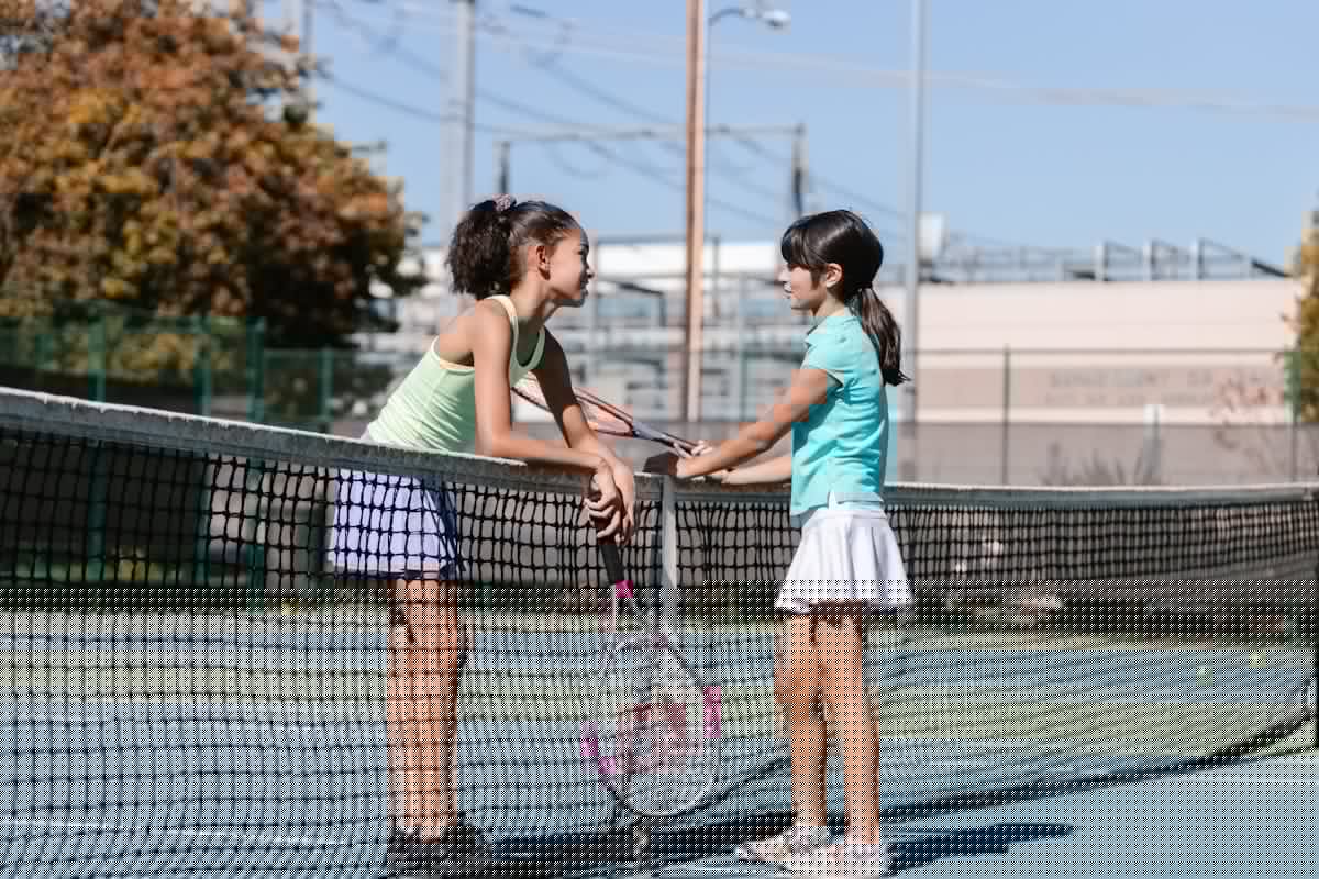 Player ready to serve during a pickleball match